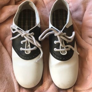 Character saddle shoes.